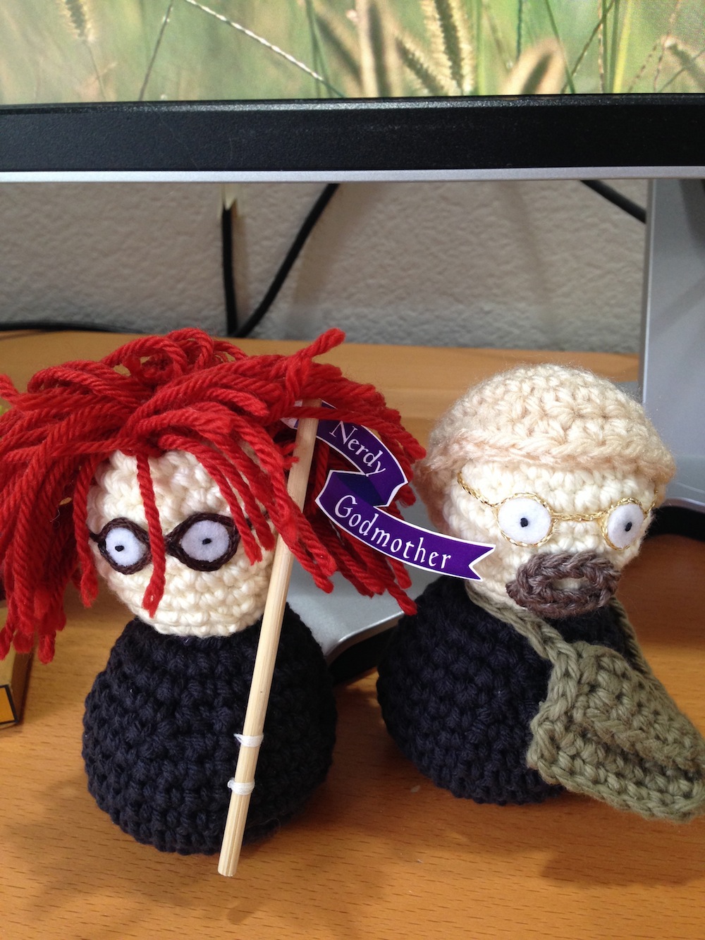 Photo of amigurumi dolls of Rebecca and James Hicks, made by Janet Dahl