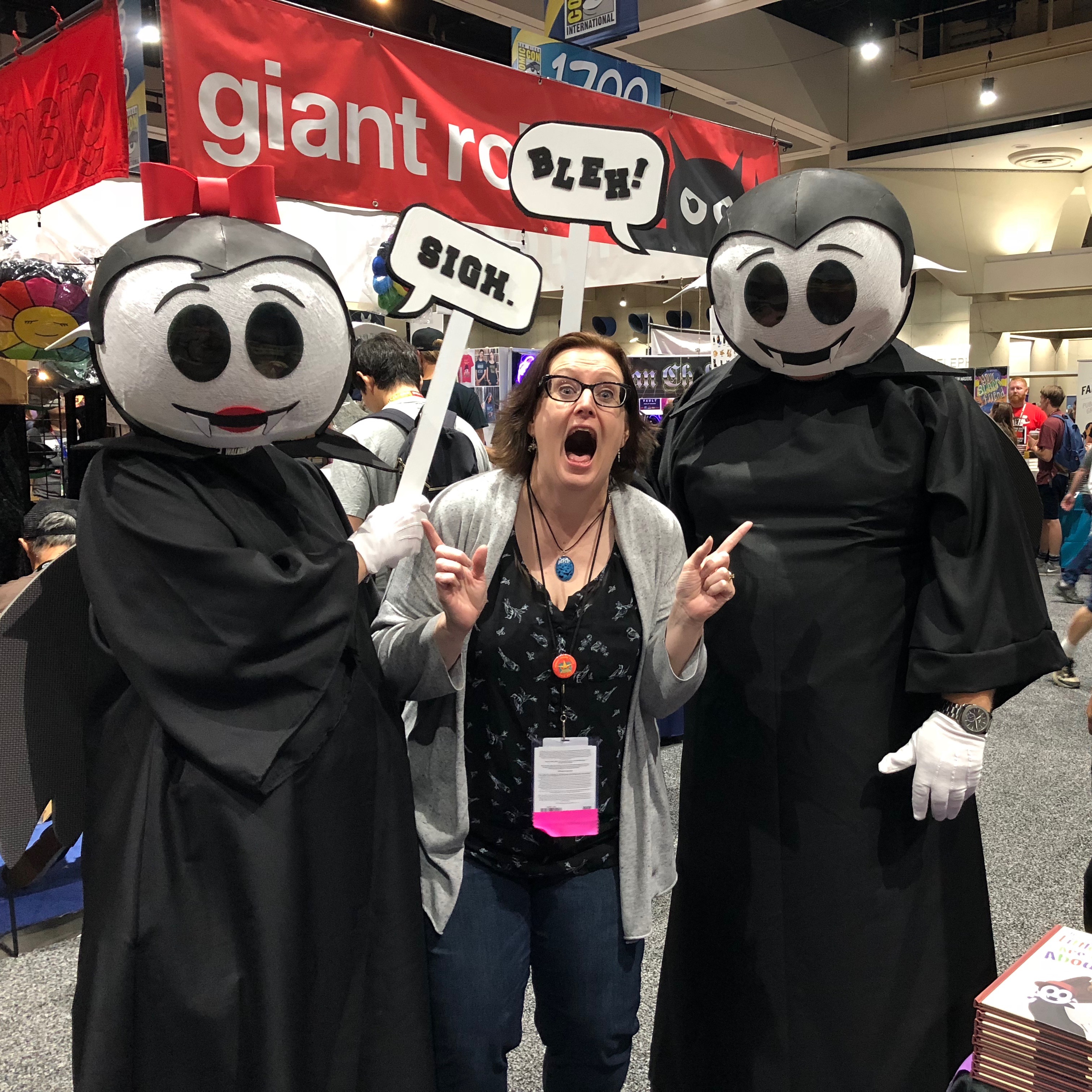 Photo of Lynn and John Gagne in Little Vampires cosplay posing with Rebecca Hicks