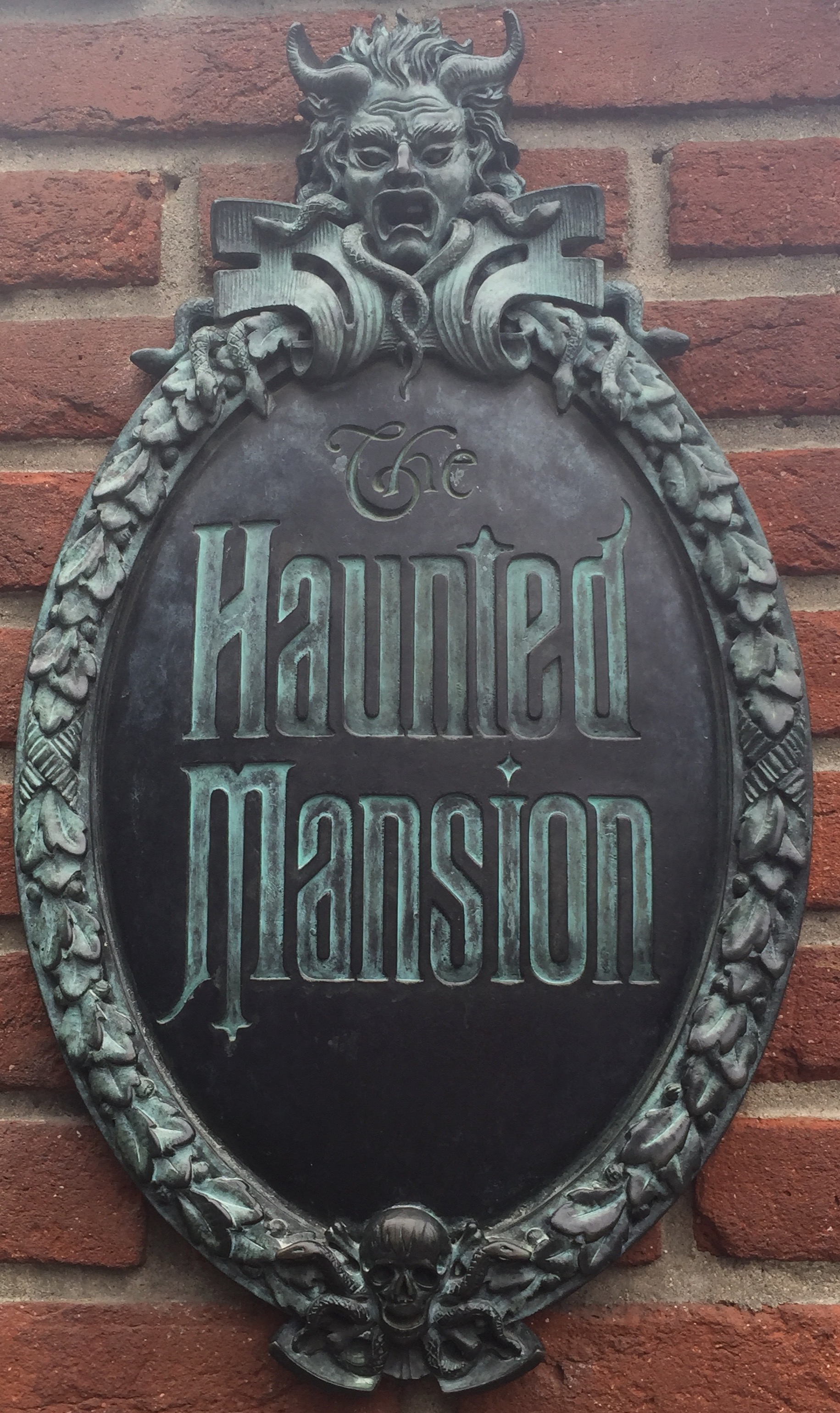 Photo of the Disneyland Haunted Mansion attraction sign