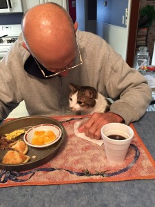 Photo of Charles Farmer and Lil' Bit the cat