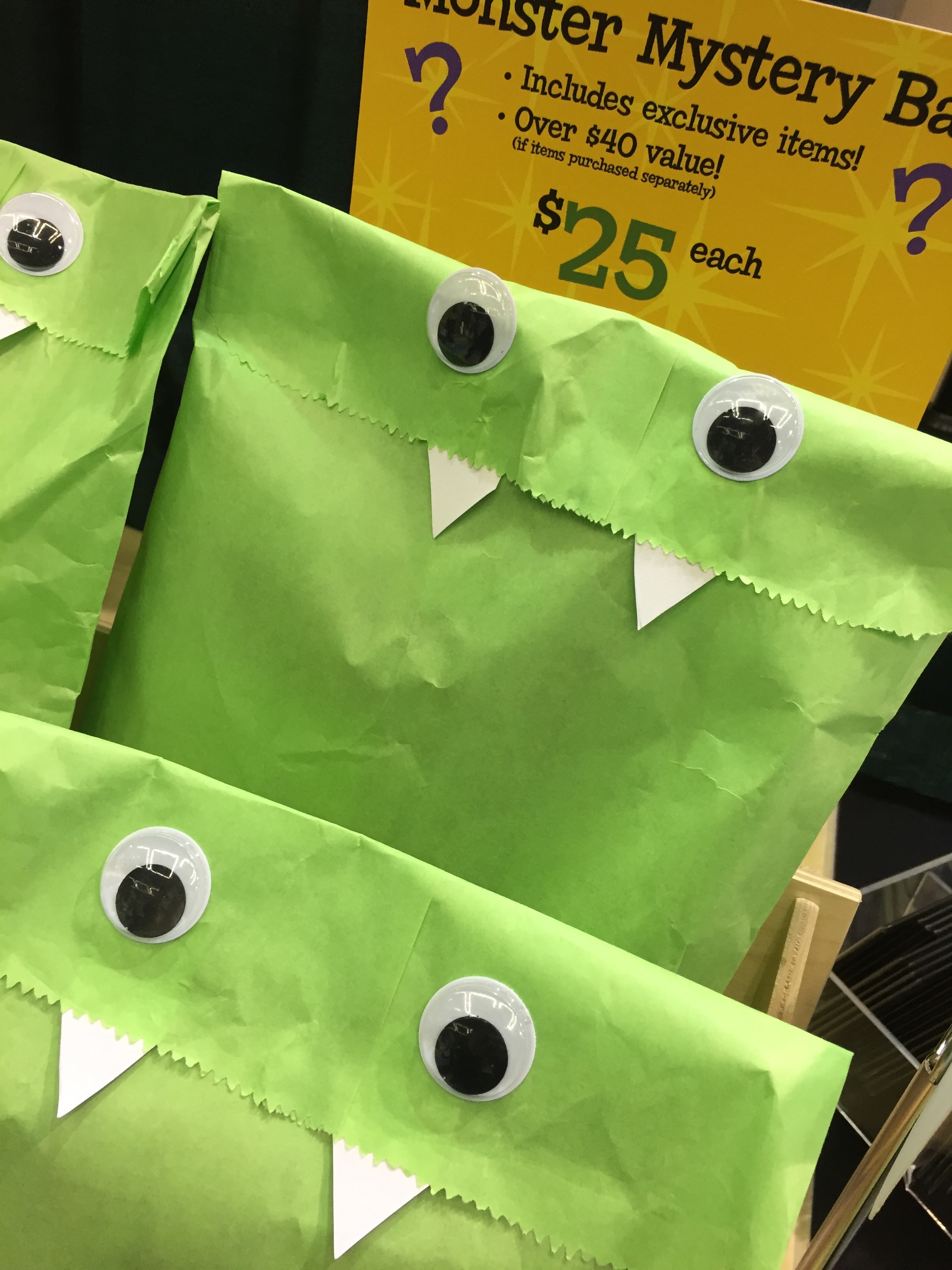 Photo of several Monster Mystery Bags, with googly eyes and fangs