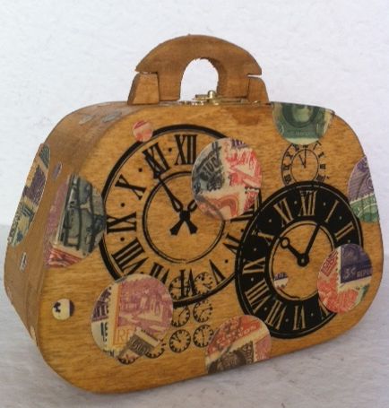 Photo of a wooden purse decorated with clock imagery