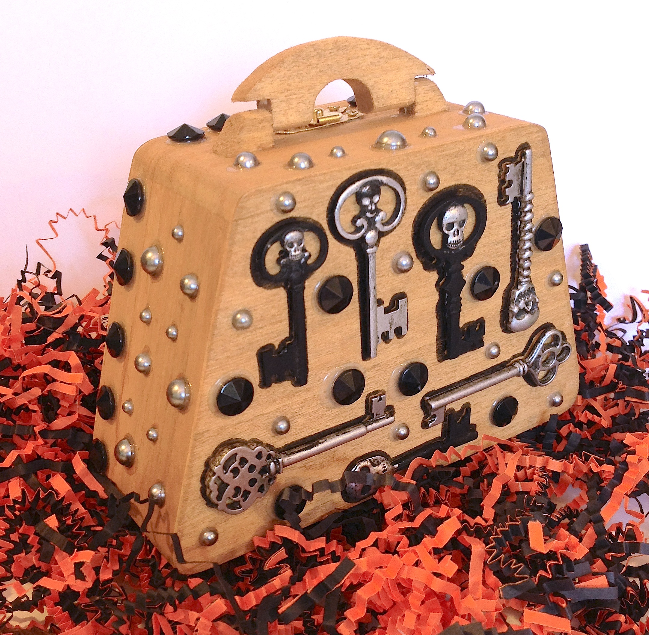 Photo of a wooden purse decorated with keys