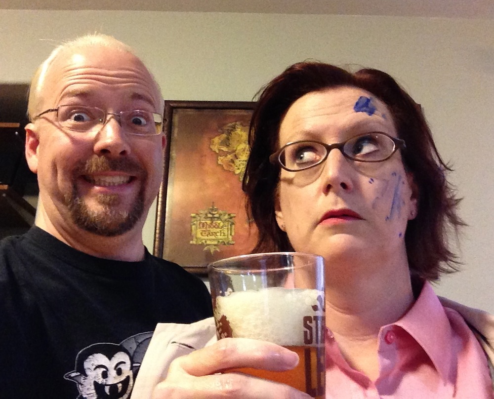 Photo of James and Rebecca Hicks posing with a nice pint