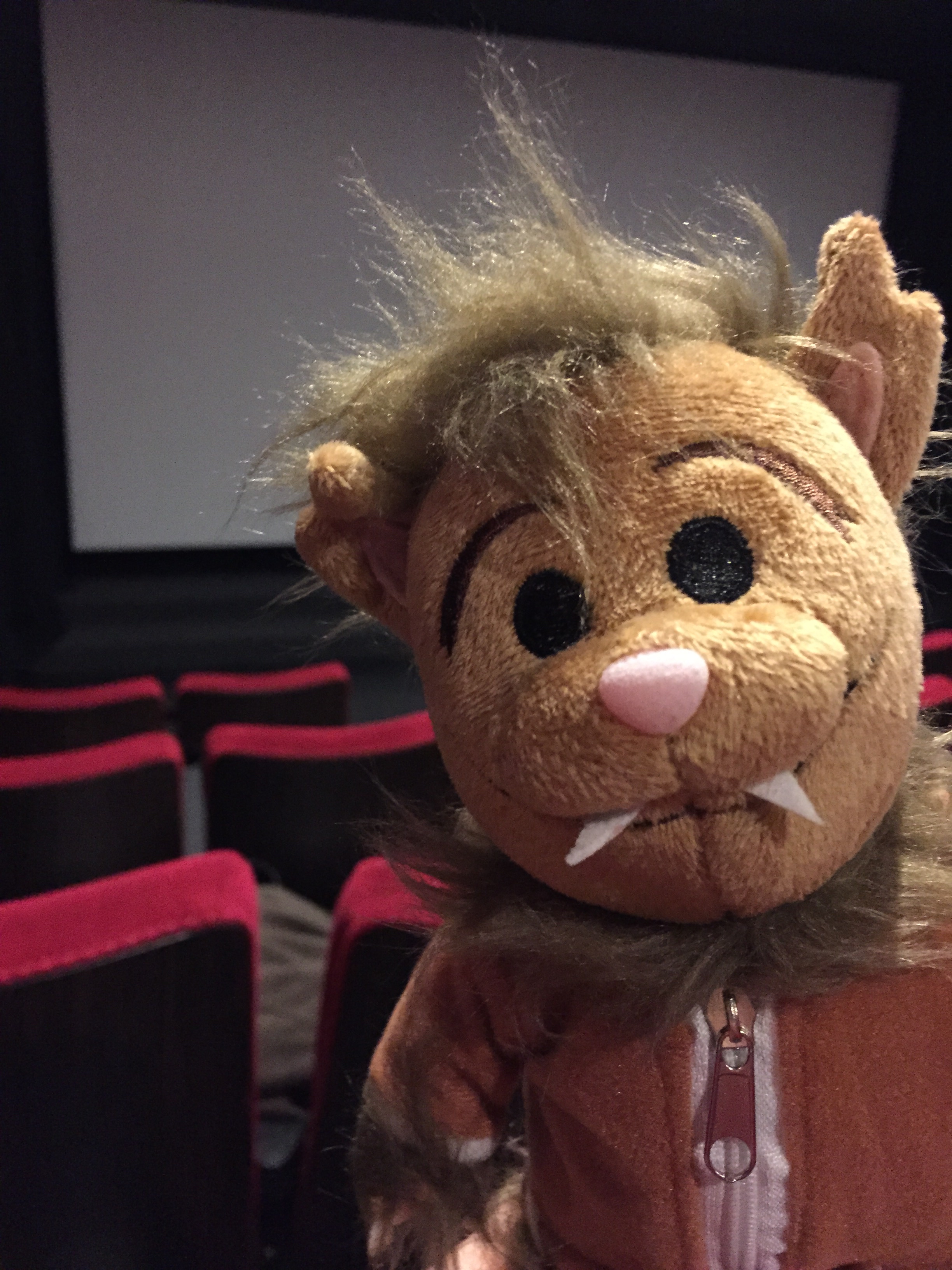 Photo of a Wolfie plush toy in a movie theater